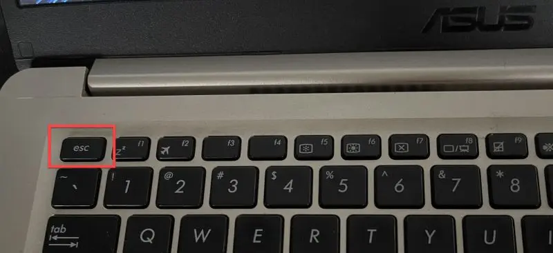 Press Esc key consecutively on your keyboard to open the boot menu