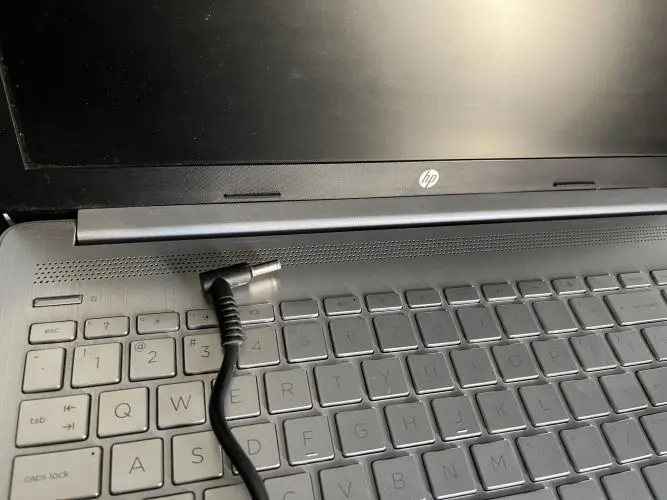 Switch off your laptop and remove the power cable