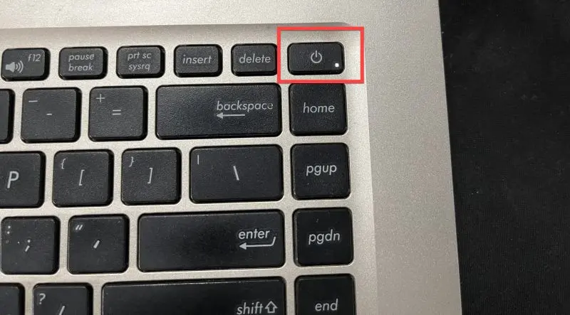 Hit the power button to turn on your laptop